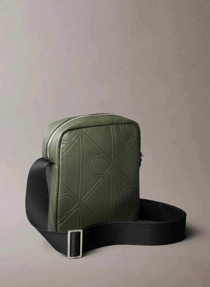 Calvin Klein Deep Depths Allover Embossed Emblem Logo Reporter Bag for Men | Best Price UAE