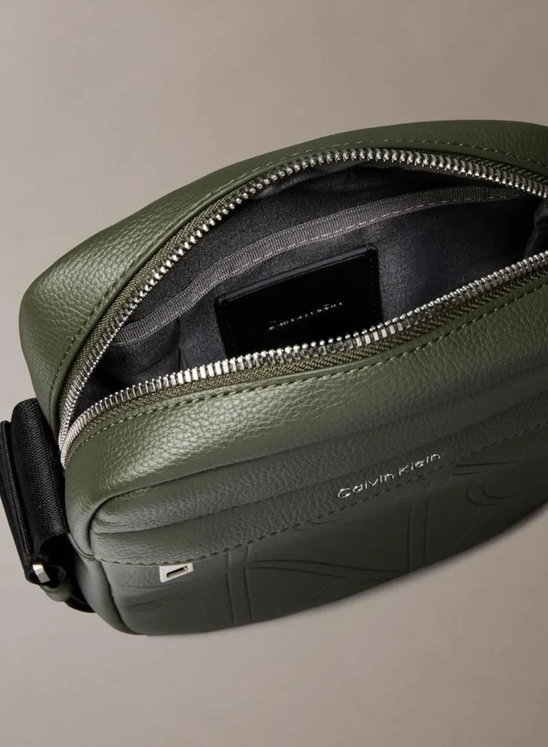 Calvin Klein Deep Depths Allover Embossed Emblem Logo Reporter Bag for Men | Best Price UAE