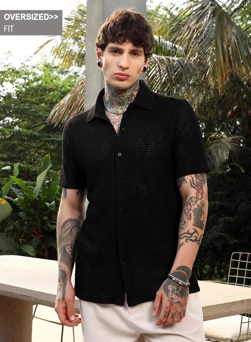 Campus Sutra Campus Sutra Men's Onyx Black Solid-Knit Oversized Shirt For Casual Wear | Spread Collar | Short Regular Sleeves | Button Closure | Oversized Shirt Crafted With Comfort Fit For Everyday Wear