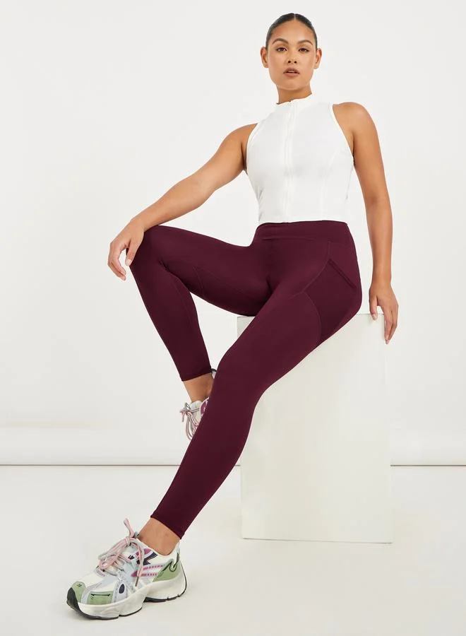 Styli Active maroon Side Mesh Pocket Broad Waistband Leggings for Women | Best Price UAE
