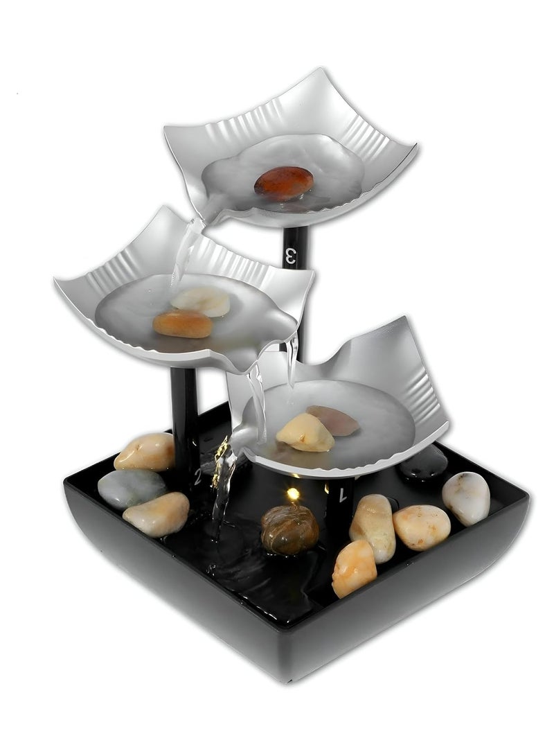 Small decorative water fountain with a three-cup waterfall design, LED lighting, and decorative pebbles – powered by electricity or battery – a calming water feature for the office, bedroom, or home to relieve stress and relax. - Image 1