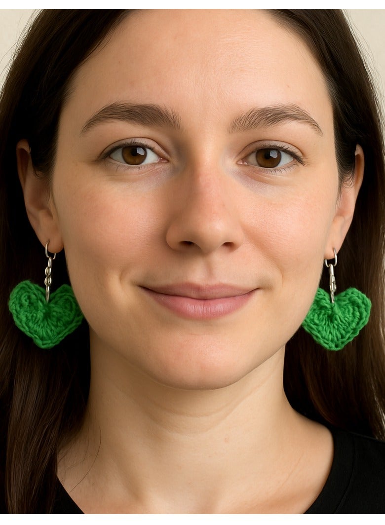 Lolly Handmade Green Crochet Heart Earrings – A unique and stylish design that adds a touch of elegance to any outfit. Made with high-quality yarn, these earrings are the perfect choice for those who love distinctive fashion and intricate details. Whether you're looking for a special gift or want to add a bit of charm to your daily look, these earrings are the perfect choice - Image 1