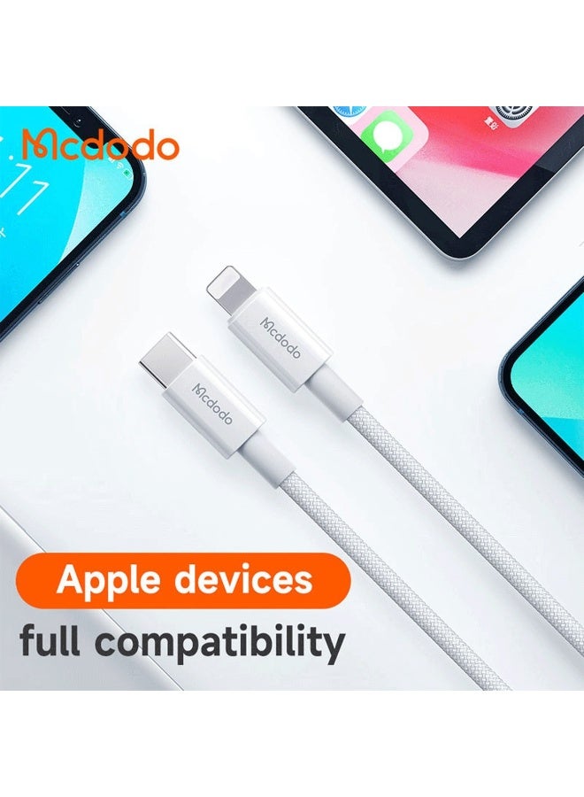 مكدودو كابل بيانات CA-276 Lightning بطول 1.20 متر، تصميم حلزوني مرن مضفر من النايلون وهيكل قوي من الألومنيوم، شحن سريع 2 أمبير، متوافق مع أجهزة iPhone وباور بانك، مؤشر حالة الشحن LED ودعم مزامنة البيانات، متين وخالٍ من التشابك. - Image 2