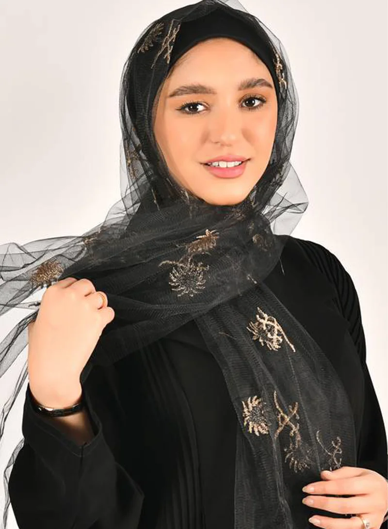HAWRAA ABAYA A black tulle veil fully decorated with two swords and a golden palm tree