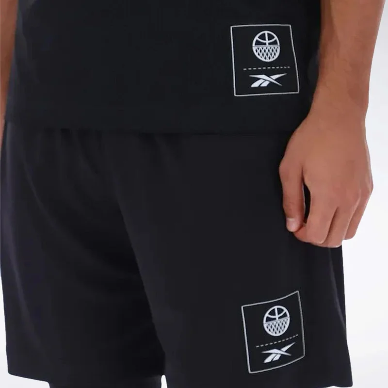 ريبوك Maximize your workout with Reebok id Basketball 2-in-1 men's training shorts. Engineered for performance, they offer freedom of movement and comfort.