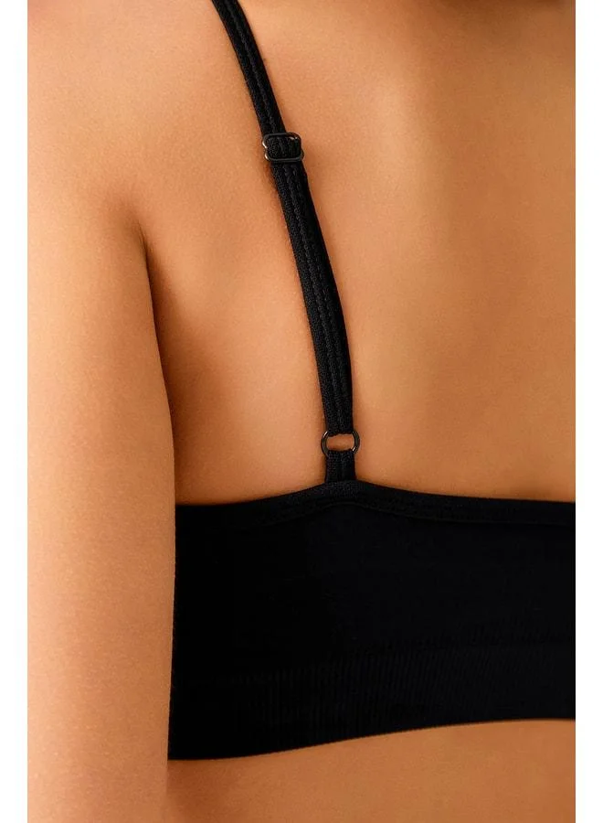 Los Ojos x Melodi Black Seamless Support Strapped Sports Bra Adjustable.