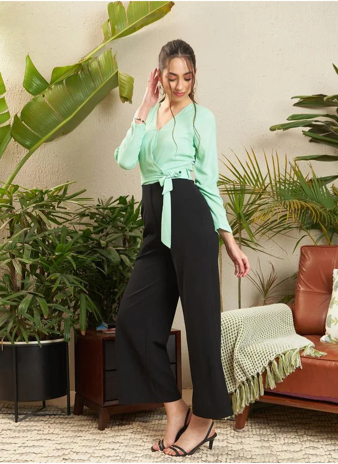 SASSAFRAS V Neck Belted Wrap Front Jumpsuit by Styli