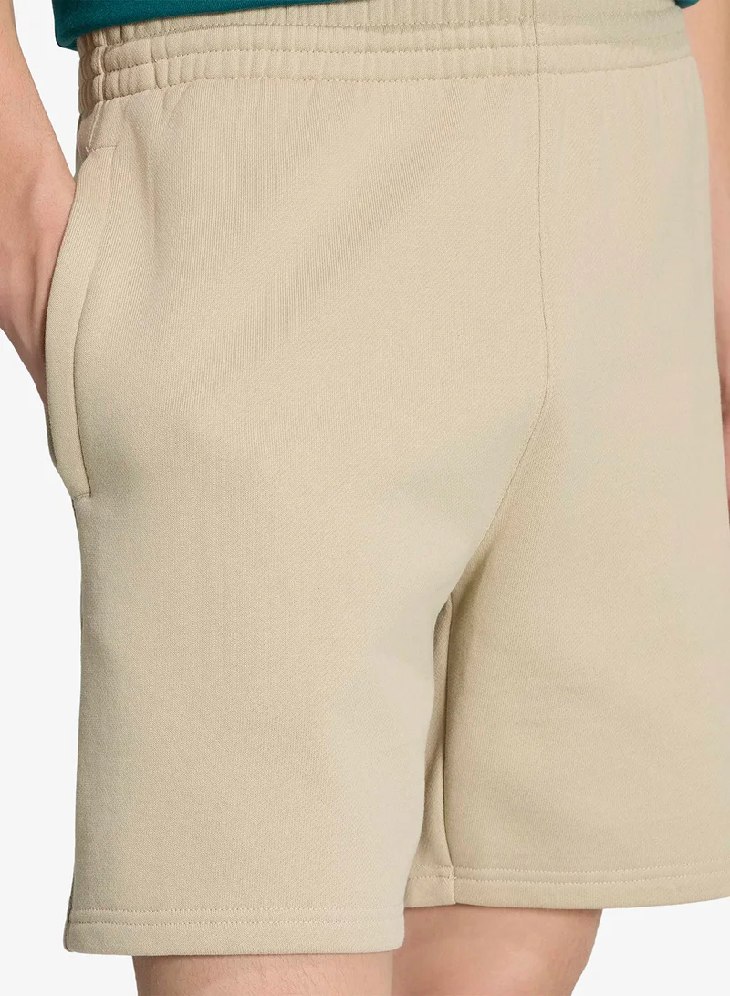 Adidas Originals KHATHR 7" Trefoil Essential Fleece Shorts for Men | Best Price UAE