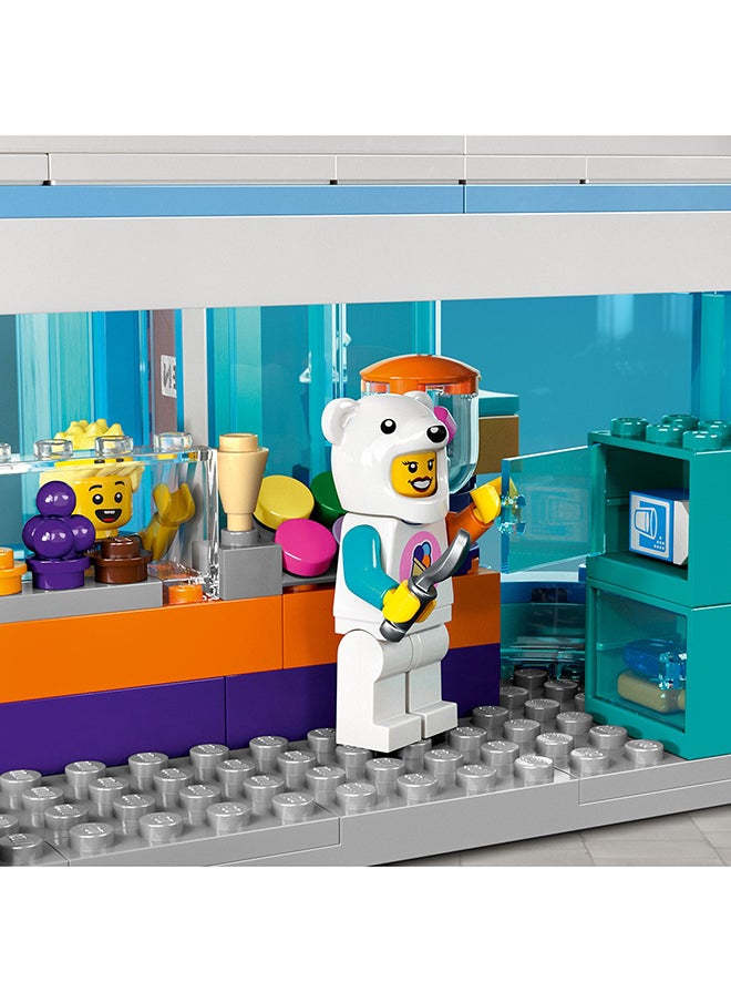 LEGO - مجموعة ألعاب بناء محل آيس كريم المدينة 60363؛ تشمل دراجة شحن، 3 شخصيات مصغرة والعديد من الميزات الممتعة والإكسسوارات للعب الأدوار الخيالية؛ فكرة هدية للأطفال من عمر 6 سنوات فما فوق (296 قطعة) - Image 1