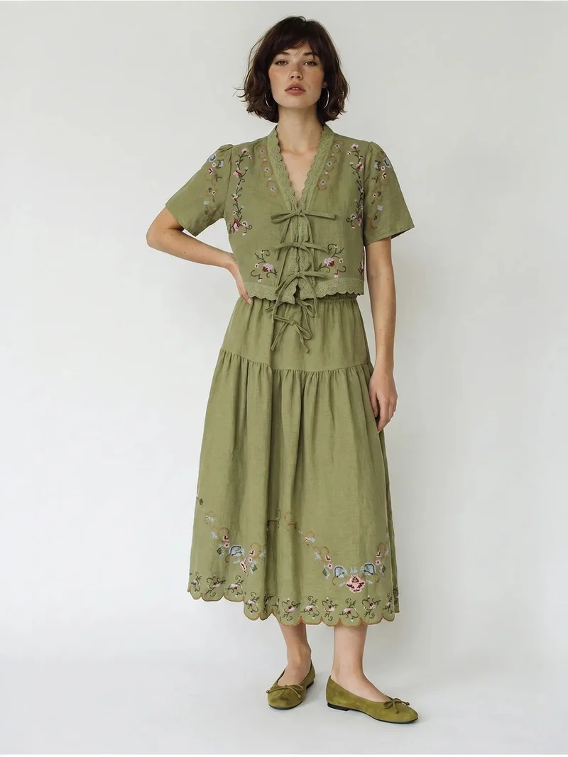 بيانكو لوتشي LUCCI Embroidered V-Neck Midi Dress