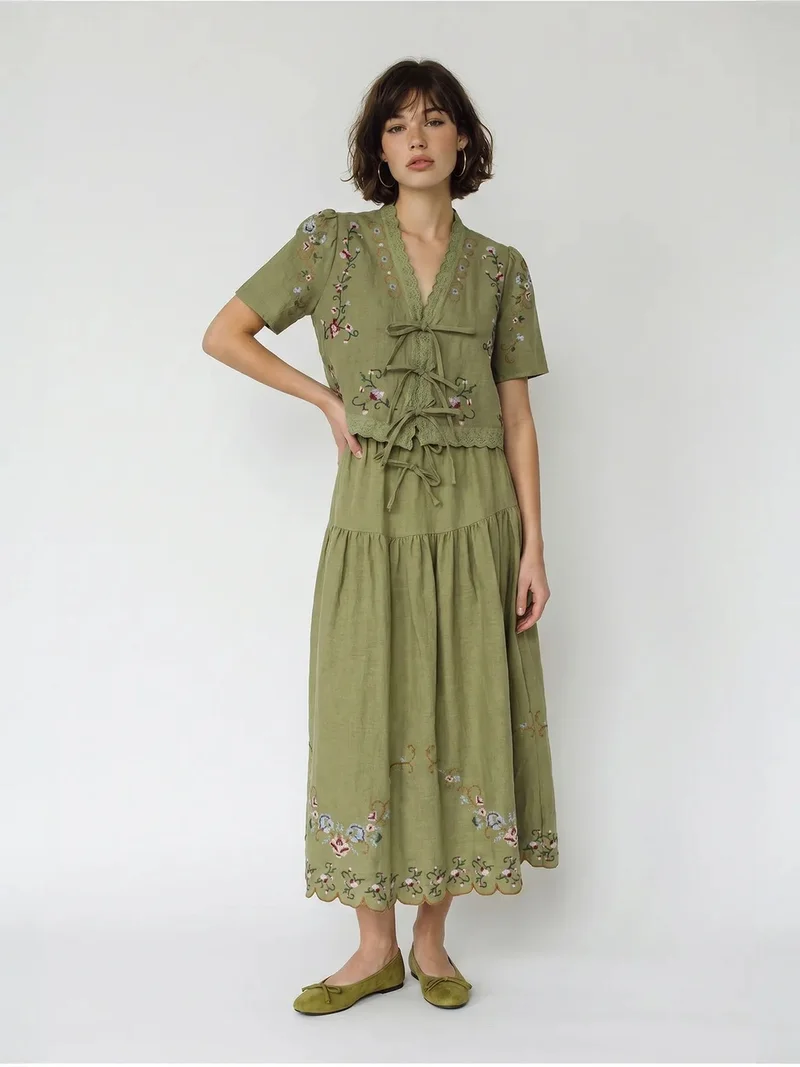 بيانكو لوتشي LUCCI Embroidered V-Neck Midi Dress