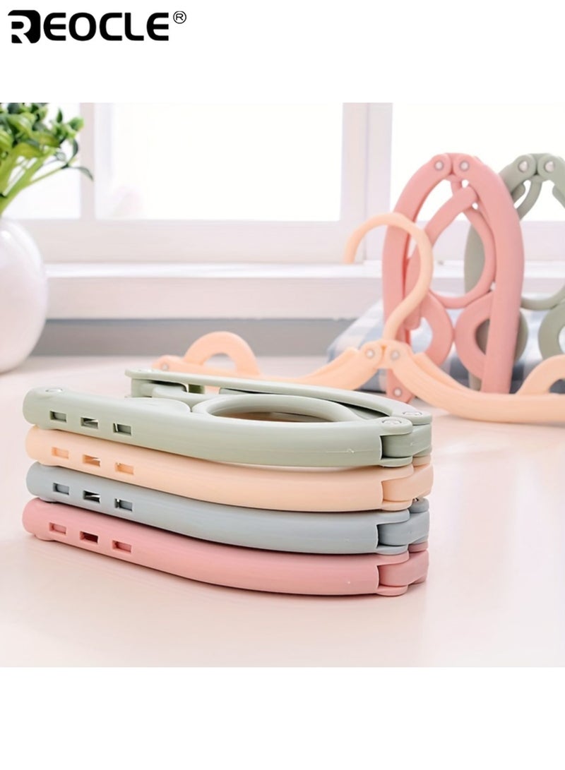 ريوكل 10 علاقات ملابس محمولة قابلة للطي، بتصميم بلاستيكي متين، وقبضة مانعة للانزلاق، وعلاقات ملابس للسفر، موفرة للمساحة، للاستخدام في خزانة المنزل. - Image 2