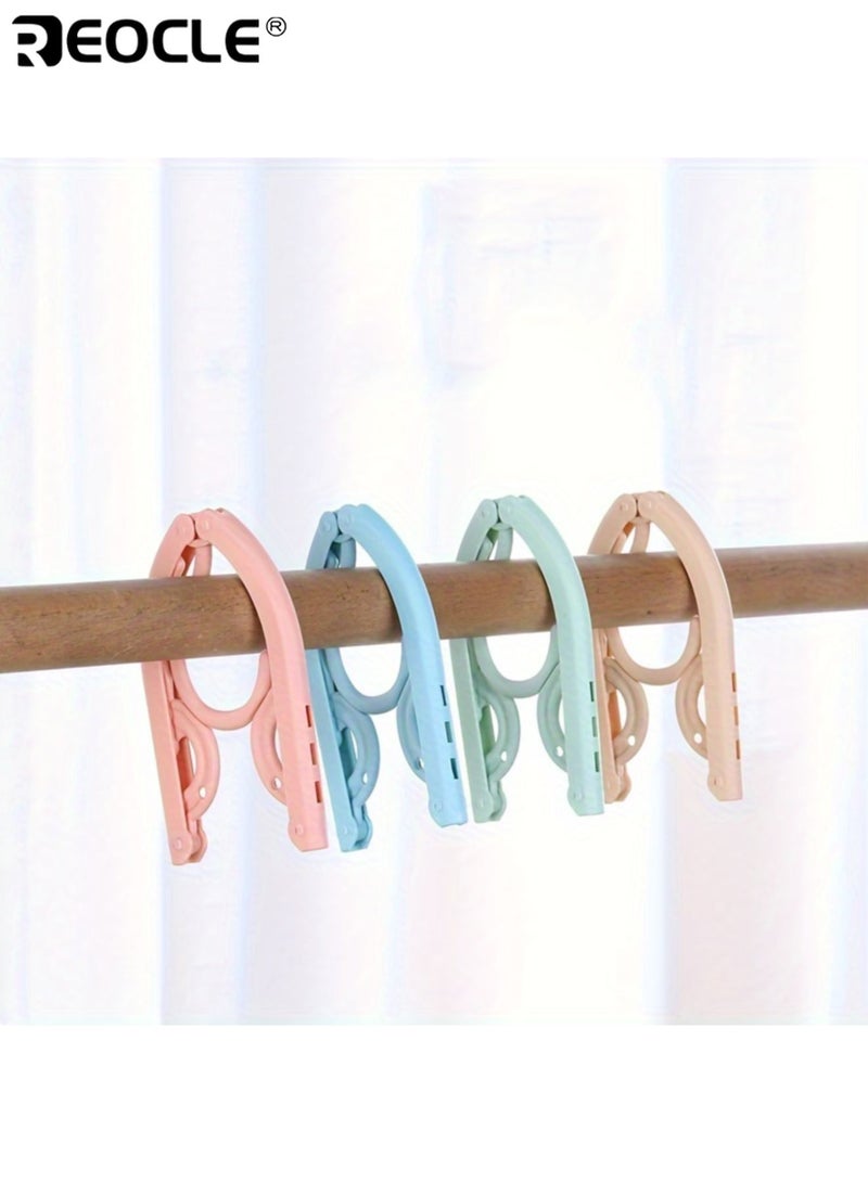 ريوكل 10 علاقات ملابس محمولة قابلة للطي، بتصميم بلاستيكي متين، وقبضة مانعة للانزلاق، وعلاقات ملابس للسفر، موفرة للمساحة، للاستخدام في خزانة المنزل. - Image 3