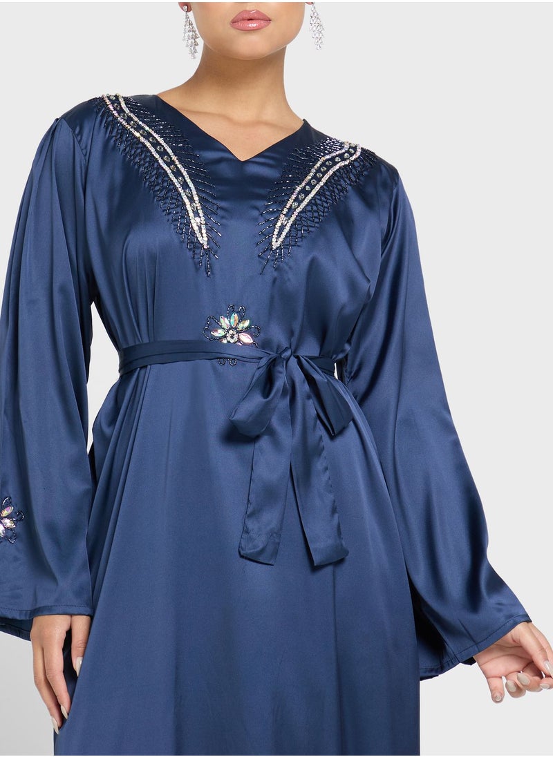 V-Neck Embellished Jalabiya - pzsku/Z5320F396D8DBB6D5352AZ/45/_/1698932876/705afc13-08bc-4435-a6d9-83a5b7f6f8cc