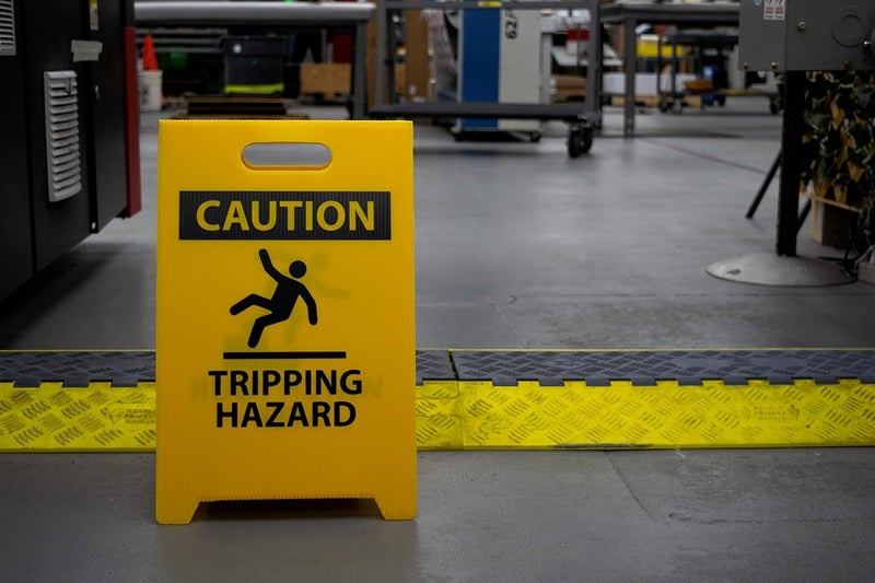 NMC FS36 CAUTION TRIPPING HAZARD Sign with Graphic - 12 in. x 19 in. Corrugated Plastic, Double-Sided Floor Sign with Black on Yellow - Image 4