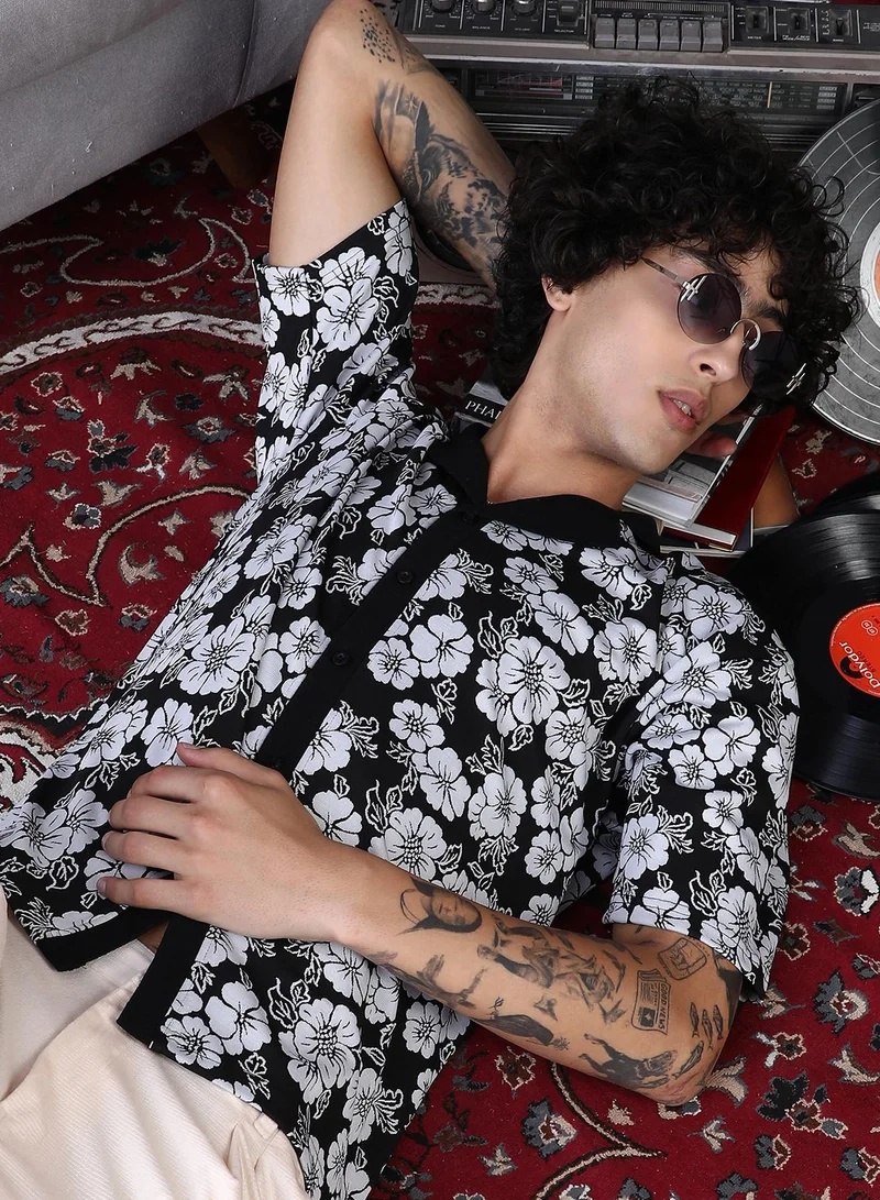 Campus Sutra Campus Sutra Men's Obsidian Black & Chalk White Bloom-Imprint Cuban-Polo Shirt For Casual Wear | Polo Neck | Short Regular Sleeves | Button Closure | Shirt Crafted With Comfort Fit For Everyday Wear