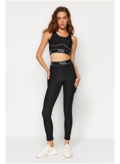 X Sagaza Studio Black Snap-Up Full Length Sports Tights With Push Up TCLAW24TY00001