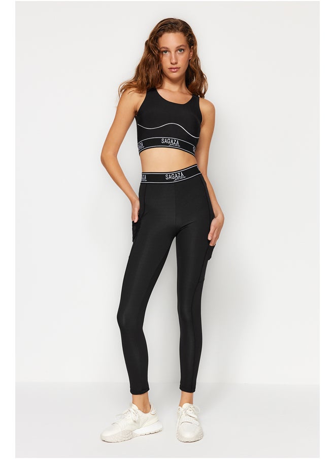 trendyol - X Sagaza Studio Black Snap-Up Full Length Sports Tights With Push Up TCLAW24TY00001 - Image 1