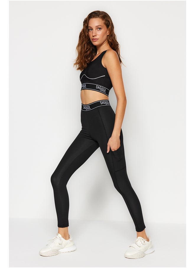 trendyol - X Sagaza Studio Black Snap-Up Full Length Sports Tights With Push Up TCLAW24TY00001 - Image 1