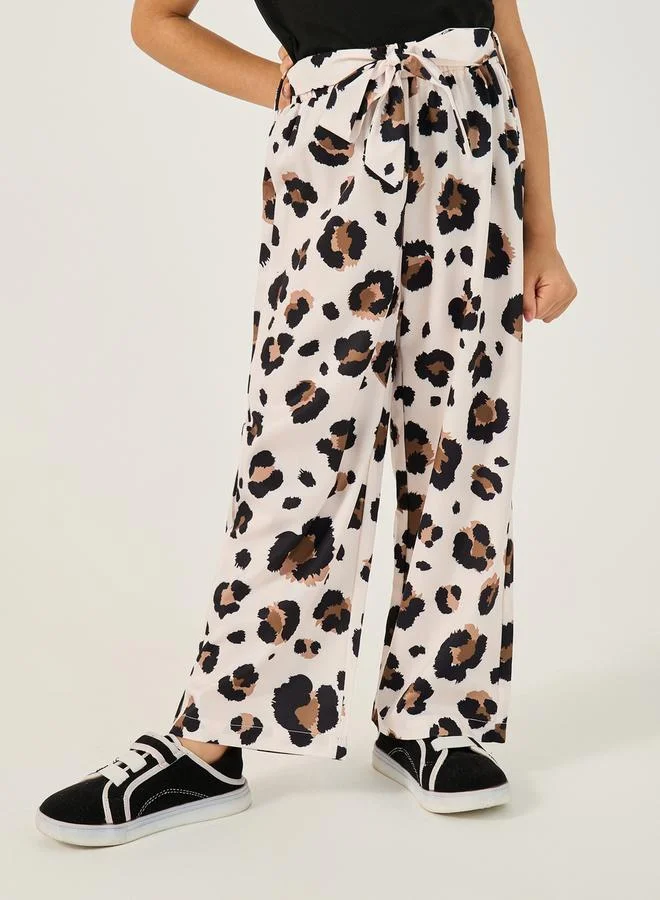 Styli Solid T-Shirt and Animal Print Pants Set
