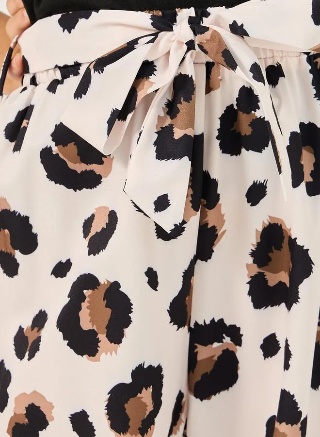 Styli Solid T-Shirt and Animal Print Pants Set