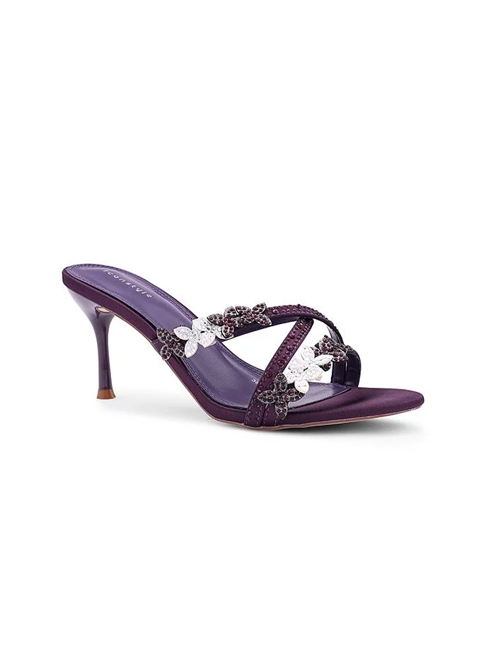 أيقون Night Purple Shiny heel slipper perfect for evening occasions.
