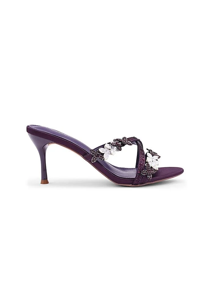 أيقون Night Purple Shiny heel slipper perfect for evening occasions.