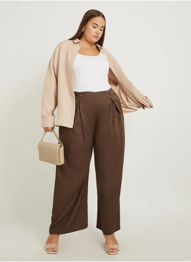 Styli Styli Plus Size Solid Pleated Wide Leg Pants with Button Detail