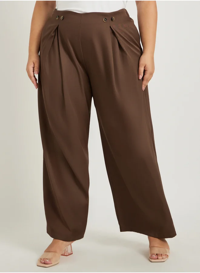Styli Styli Plus Size Solid Pleated Wide Leg Pants with Button Detail