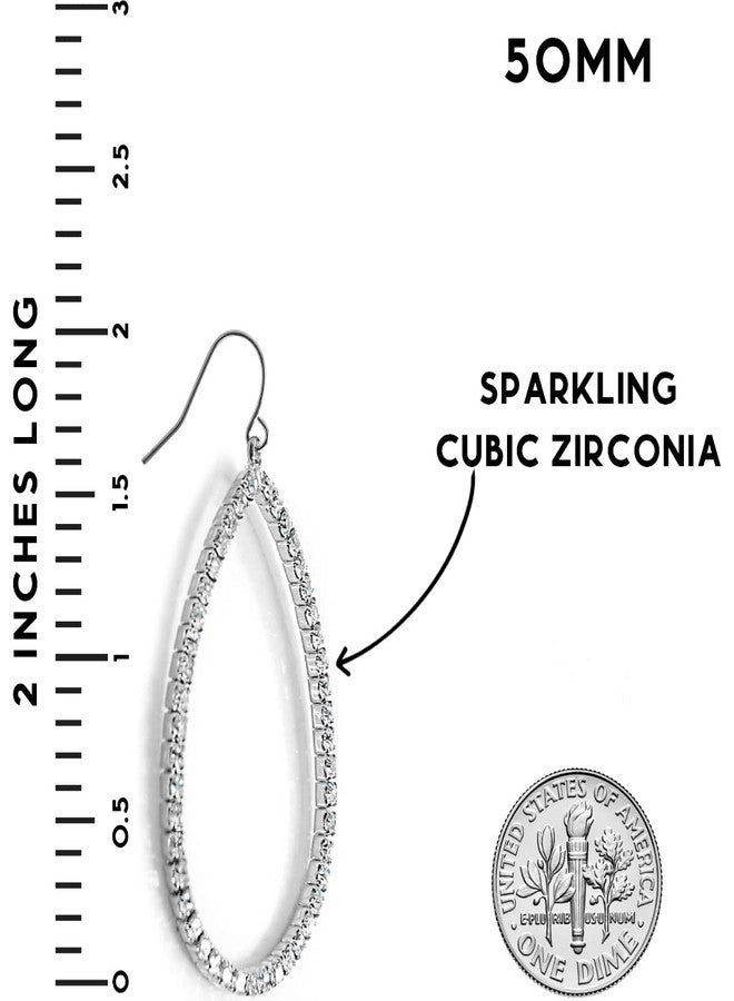 هامبل شيك نيويورك أقراط فضية اللون على شكل دمعة للنساء - أقراط فضية لامعة متدلية، مرصعة بأحجار الراين، وأقراط طويلة متدلية من الزركونيا المكعبة على شكل دمعة، مثالية لحضور حفلات الزفاف، ووصيفات العروس، وحفلات التخرج، وأقراط متدلية من الزركونيا المكعبة على شكل دمعة. - Image 4