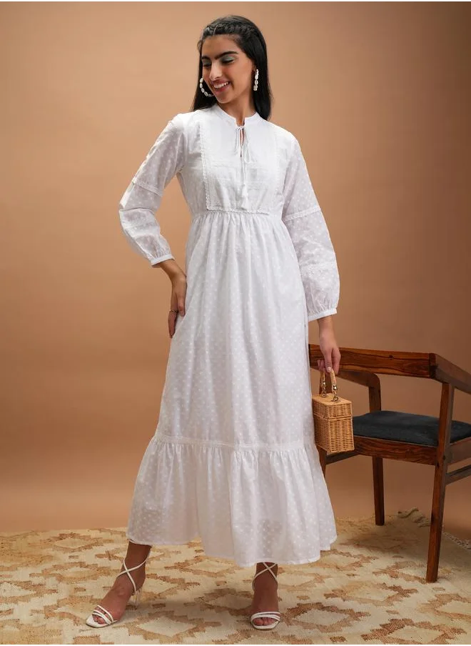 Vishudh Dobby Tie-Up Neck Tiered Maxi Dress by Styli