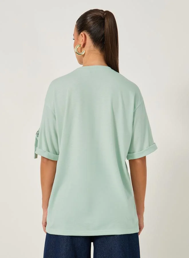 Styli Styli Oversized Round Neck T-Shirt with Utility Pocket Detail