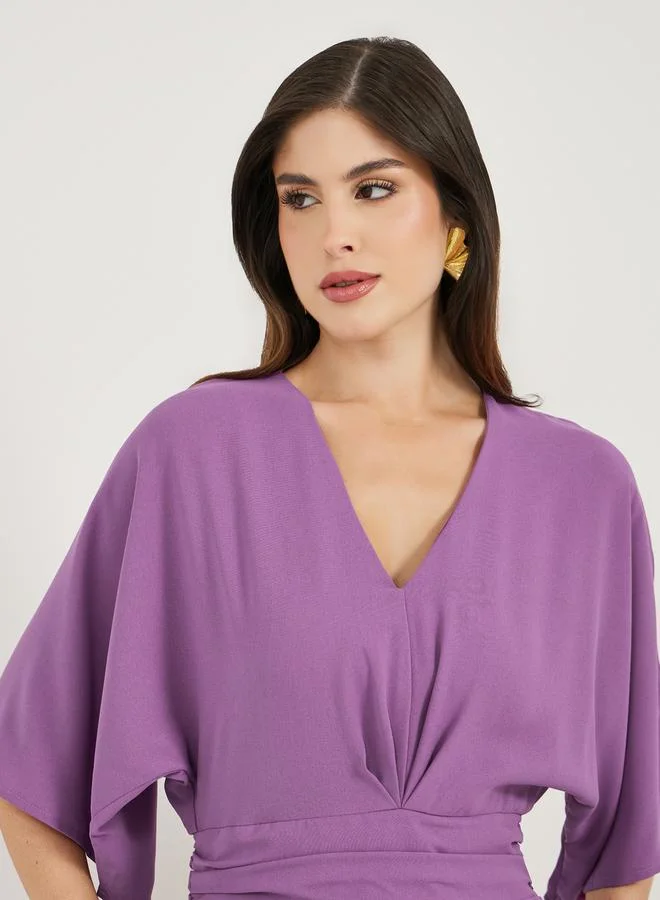 Styli Batwing Sleeve Flared Wide Leg Jumpsuit