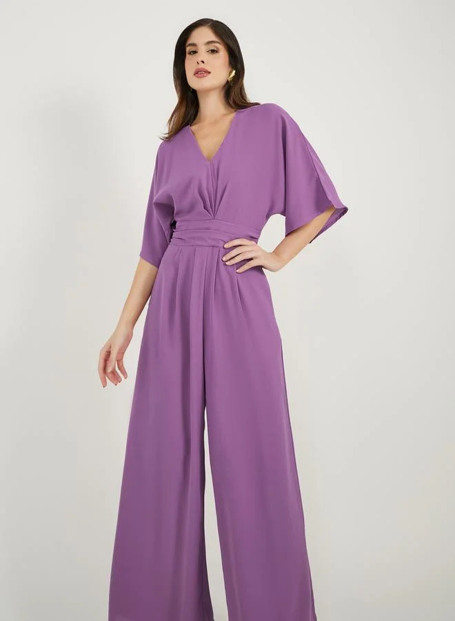 Styli Batwing Sleeve Flared Wide Leg Jumpsuit