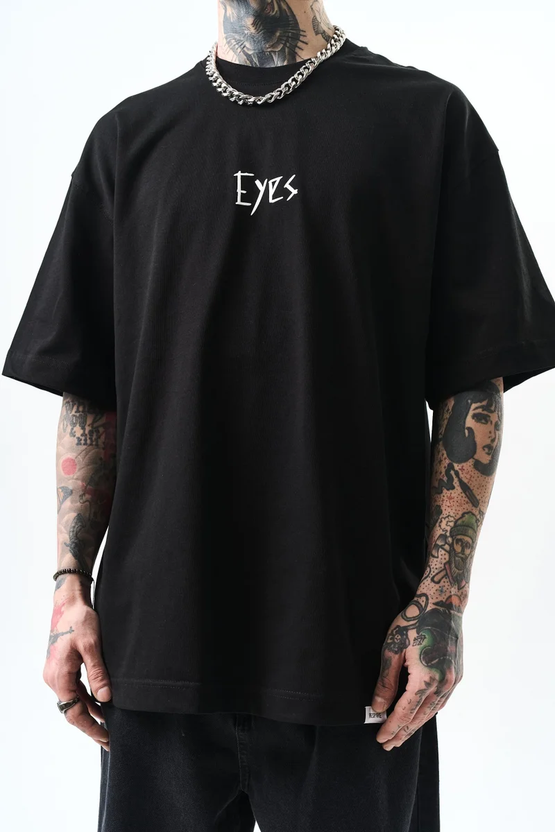 ريسباير تي شيرت رجالي مقاس كبير (Oversize) بطبعة "Eyes"، أسود