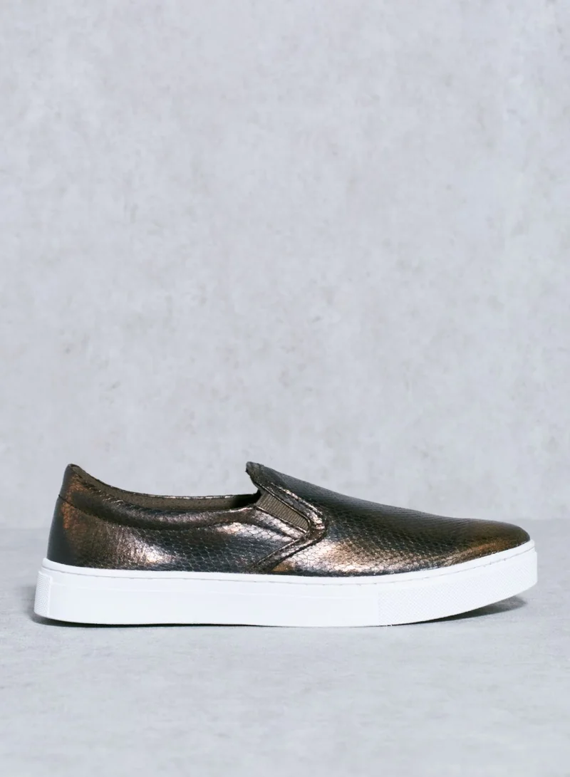 GUESS Snake Print Slip Ons