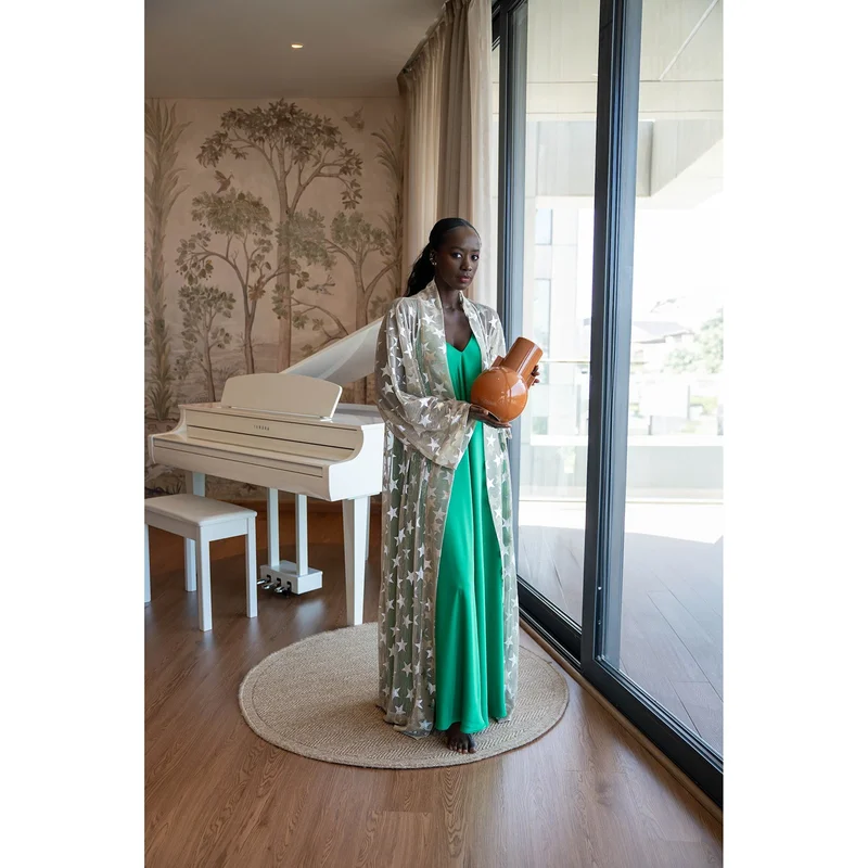 جانارا جونز فستان مارييلا ساتان أخضر