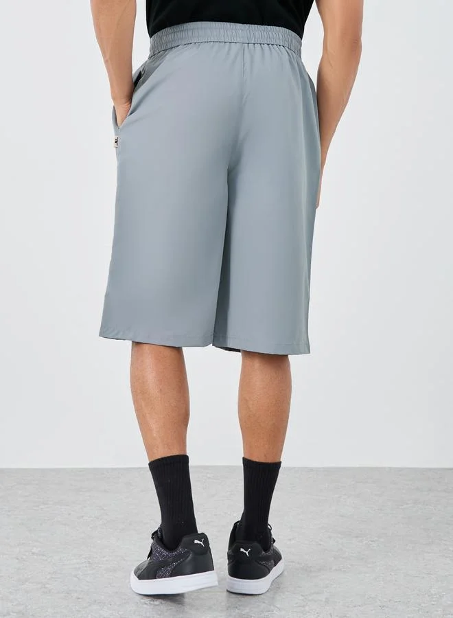 Styli Styli Men Grey Oversized Shorts with Badge Detail