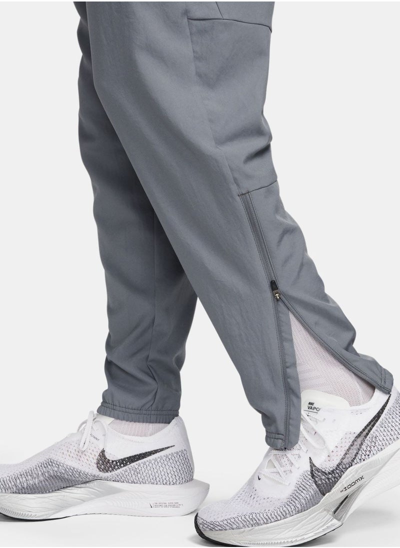Nike - Dri-Fit Challenger Woven Pants - Image 1