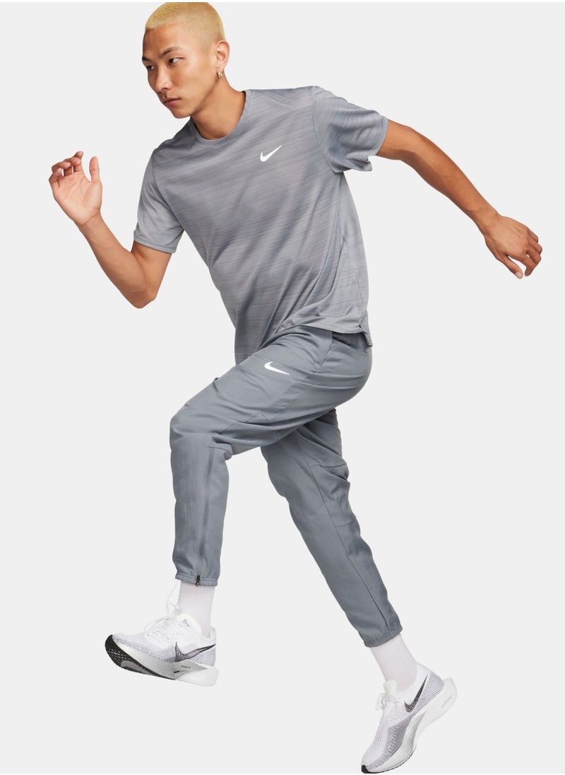 Nike - Dri-Fit Challenger Woven Pants - Image 1