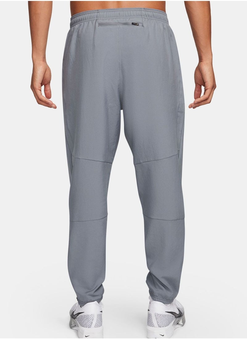 Nike - Dri-Fit Challenger Woven Pants - Image 1