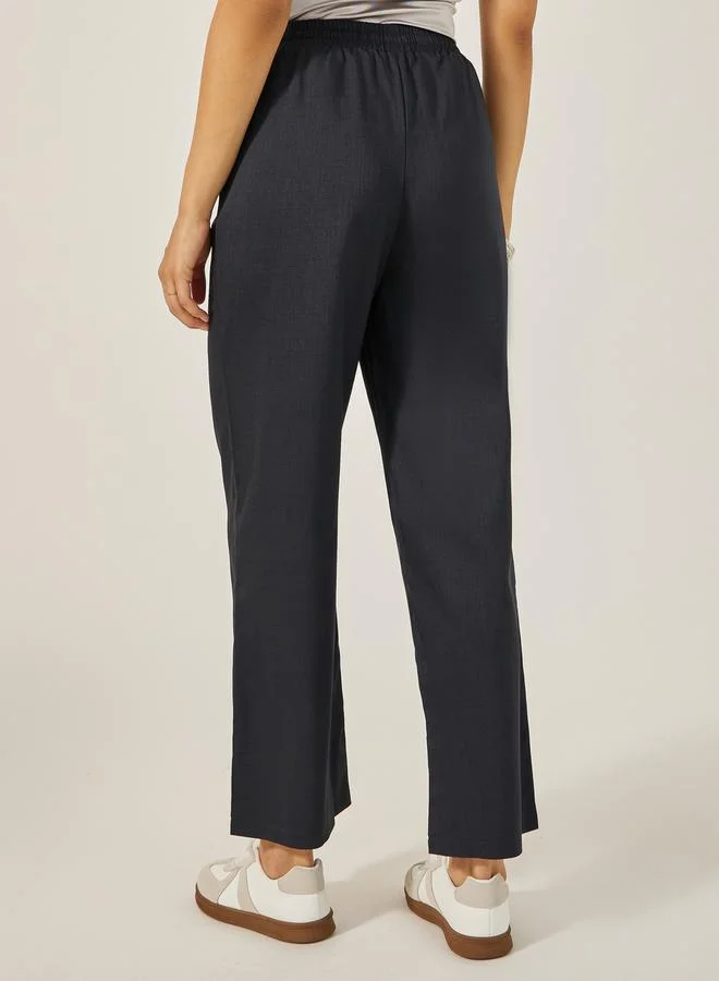 Styli Textured Mid Rise Wide Leg Pants with Drawstring