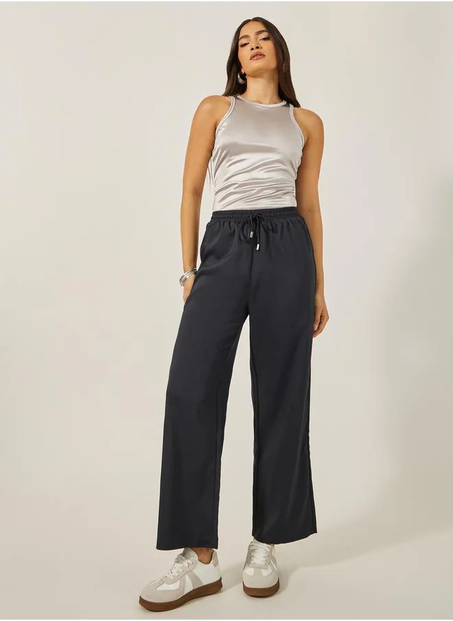 ستايلي Textured Mid Rise Wide Leg Pants with Drawstring