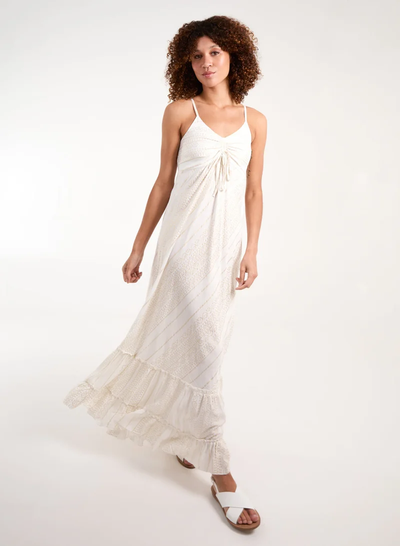 بلو فانيلا فستان ماكسي ذهبي بخيوط لامعة وربطة أمامية