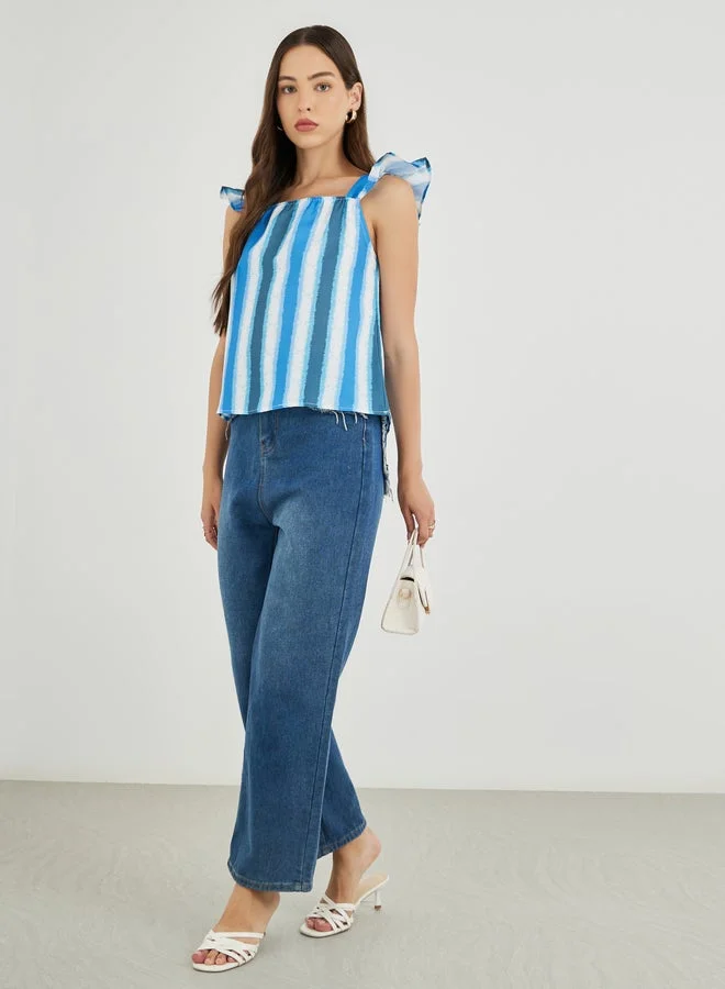 تايك تو بلوزة بدون أكمام مكشكشة مخططة من تيك تو