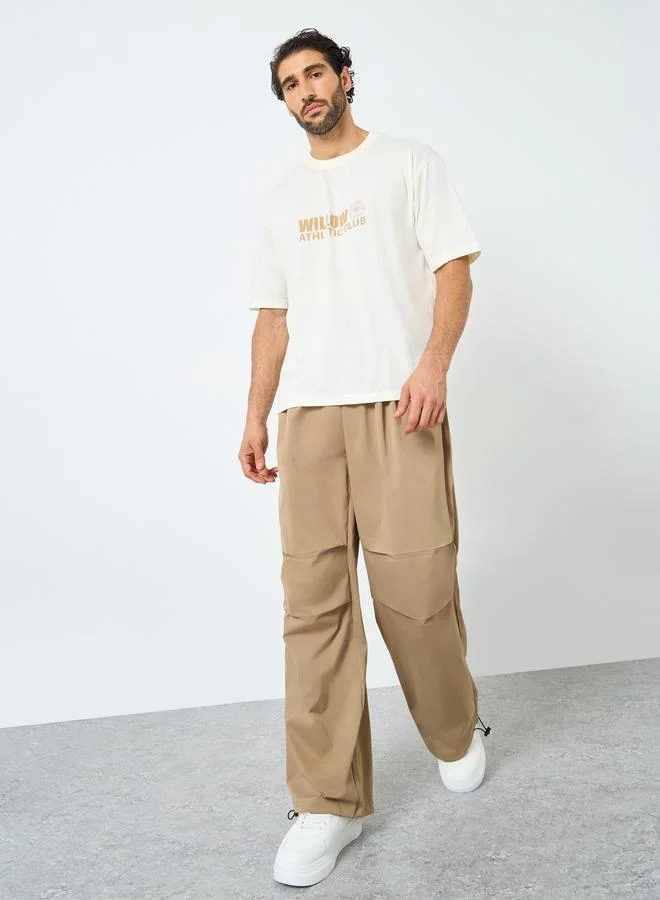 Styli Styli Men Cream Graphic Print Oversized T-Shirt