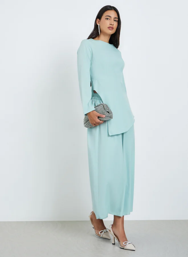 ستايلي مجموعة من تنورة ماكسي وبلوزة بحافة غير متماثلة