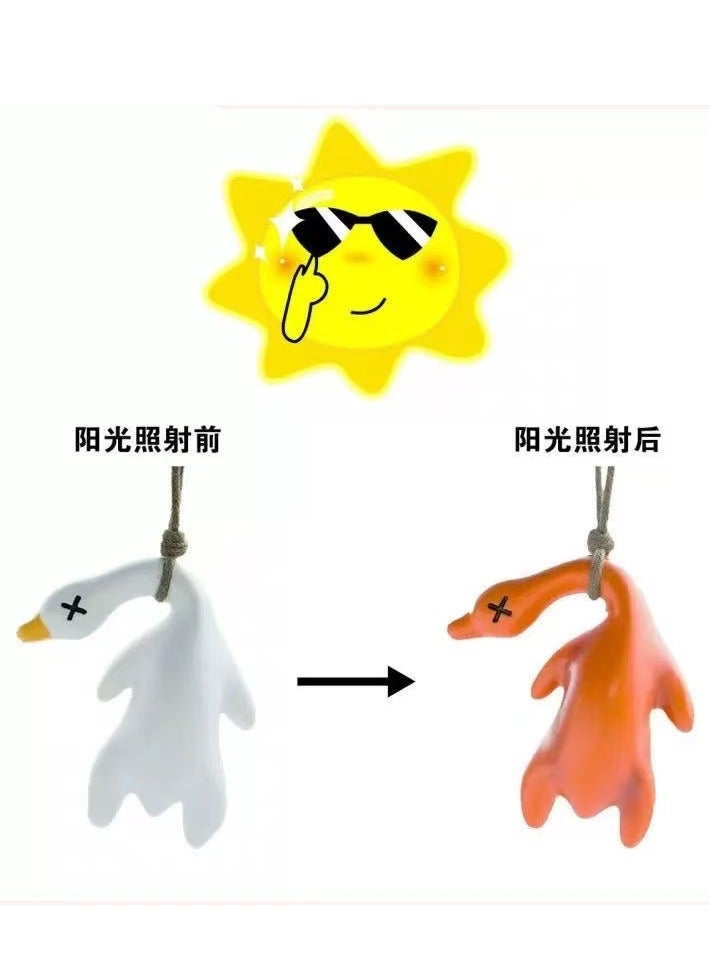 چينيرال براند الأشعة فوق البنفسجية تغيير لون بطة قلادة السيارات - بطة مشوية الراتنج مرآة الرؤية الخلفية الديكور ، الديكور الداخلي للسيارات تنشيط ضوء الشمس