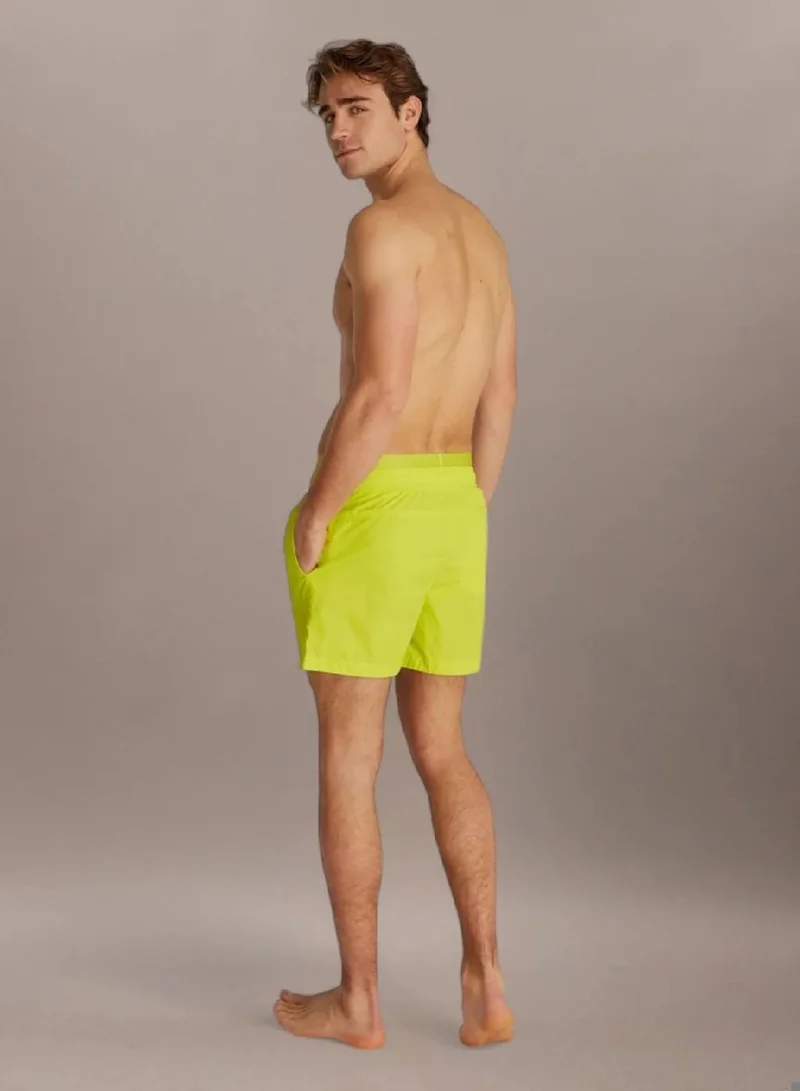 كالفن كلاين جينز شورت سباحة بخصر مزدوج من النايلون الناعم سي كيه