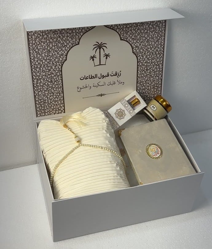 Royal Serenity Carpet Package with a spiritual arrangement inside a luxurious box - Image 1